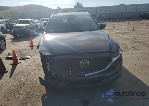 2021 Mazda Cx-5 Signature z USA, uszkodzony, nr VIN JM3KFBEY8M0418515